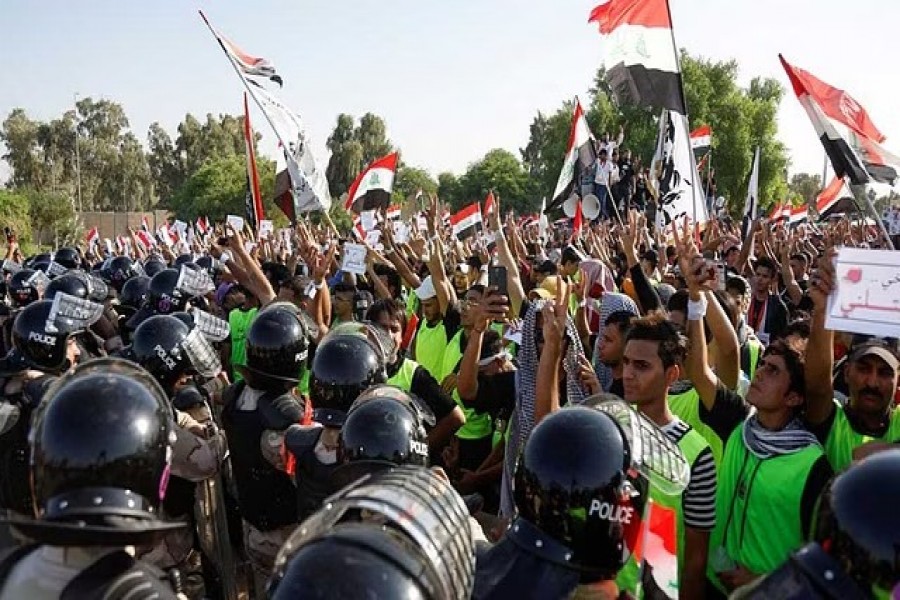 Iraqi protesters gather to mark the third anniversary of the anti-government protests in Baghdad, Iraq October 1, 2022. REUTERS/Khalid al-Mousily