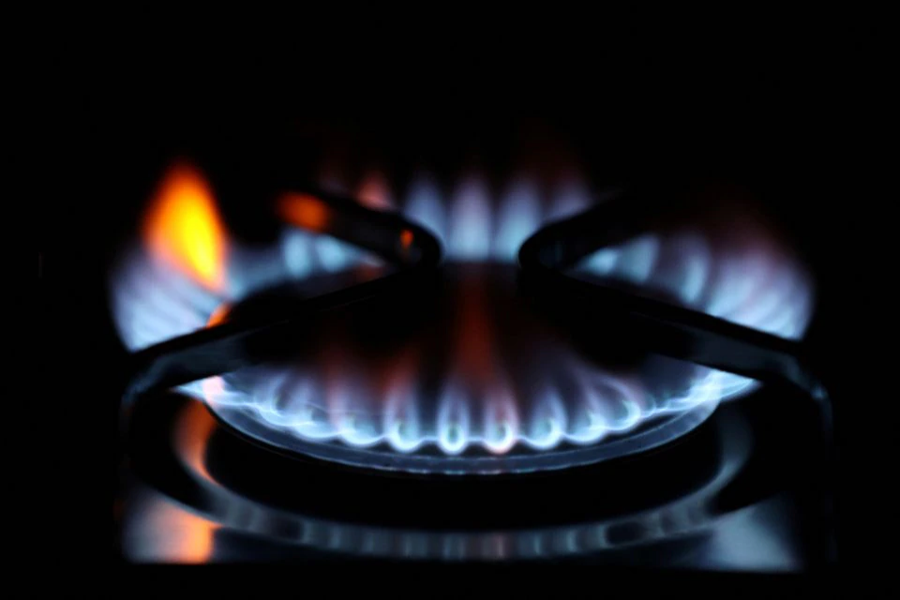 Flames come out of a domestic gas ring of an oven in Durham, Britain on September 23, 2021 — Reuters/Files