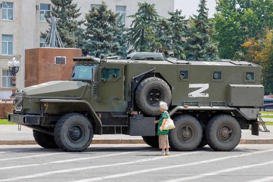 An armoured truck of pro-Russian troops is parked near Ukraine's former regional council's building during Ukraine-Russia conflict in the Russia-controlled city of Kherson, Ukraine July 25, 2022. REUTERS/Alexander Ermochenko