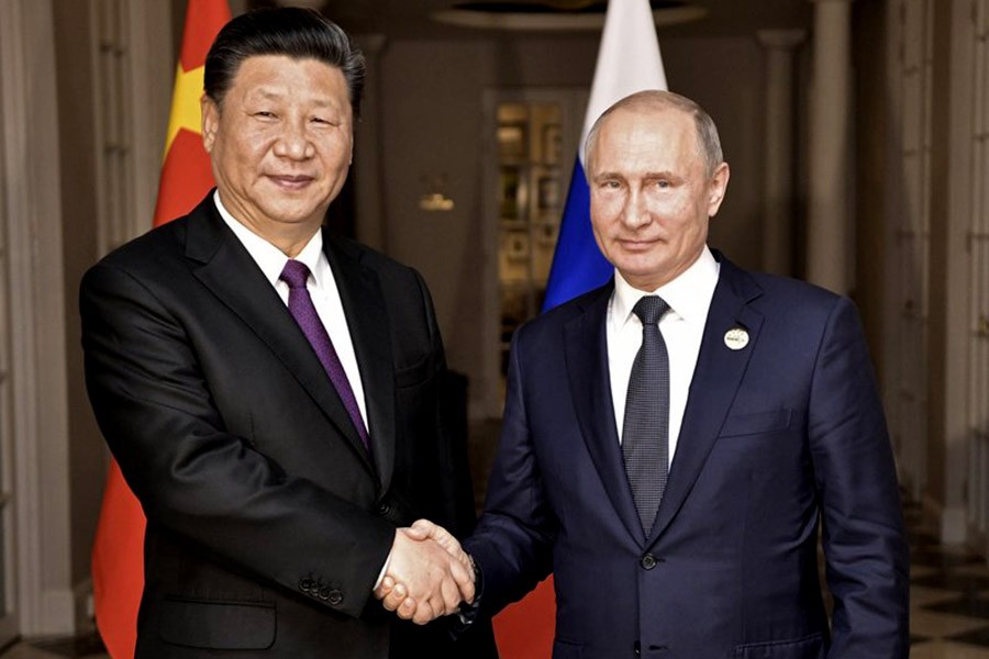 Putin congratulates China's Xi on unprecedented third term