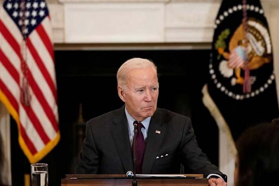 US President Joe Biden listens to a guest doctor speak during a meeting of the Reproductive Healthcare Access Task Force in the State Dining Room at the White House in Washington, US, October 4, 2022. REUTERS/Elizabeth Frantz