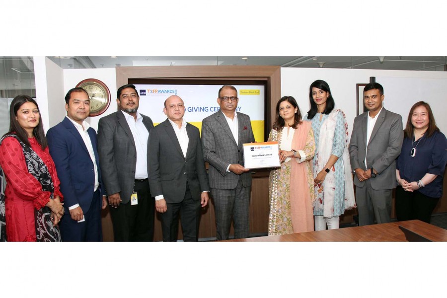 EBL Managing Director and CEO Ali Reza Iftekhar receives the ‘Best TFP Green Deal (Issuing Bank) Award from Neha Noronha, Relationship Manager ADB TSCFP (Trade Finance Program), at EBL corporate head office in Dhaka. Through this award, ADB recognises trade finance initiatives of financial institutions that specifically involve environmental sustainability components.