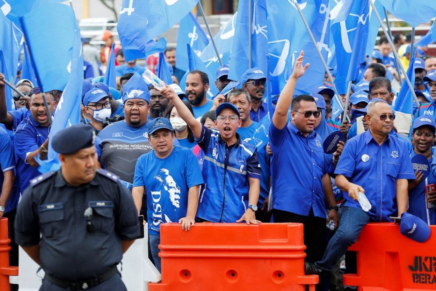 The supporters of The National Front coalition, Barisan Nasional, shout slogans outside a nomination centre on nomination day in Bera, Pahang, Malaysia on November 5, 2022 — Reuters photo