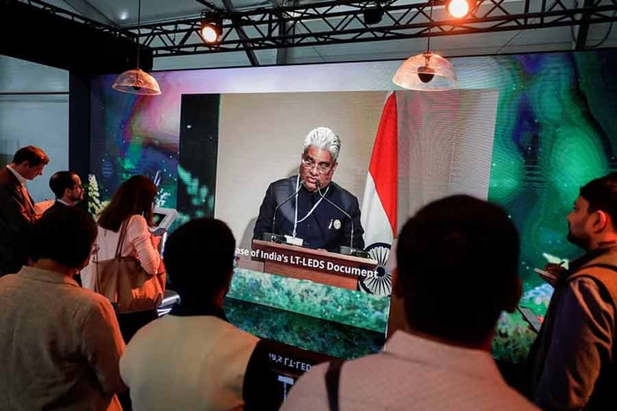 People watching the address of India's Union Cabinet Minister for Environment, Forest & Climate Change Bhupender Yadav at a news conference during the COP27 climate summit in Sharm el-Sheikh of Egypt on Monday –Reuters photo