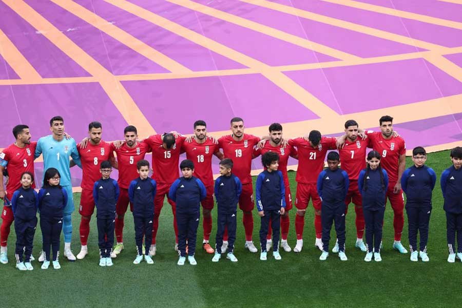 Iran players lining up during the national anthems before their Word Cup match against England at Khalifa International Stadium in Doha on Monday –Reuters photo