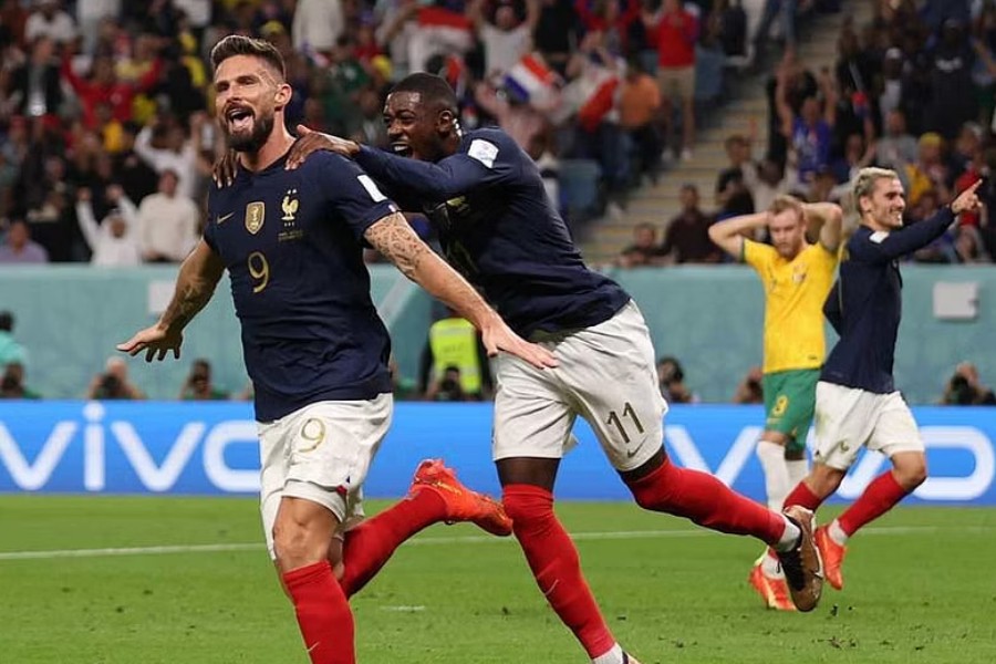 Giroud double equals record as holders France crush Australia