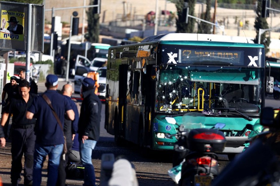 A damaged bus is seen following an explosion at a bus stop in Jerusalem November 23, 2022. REUTERS/Ronen Zvulun