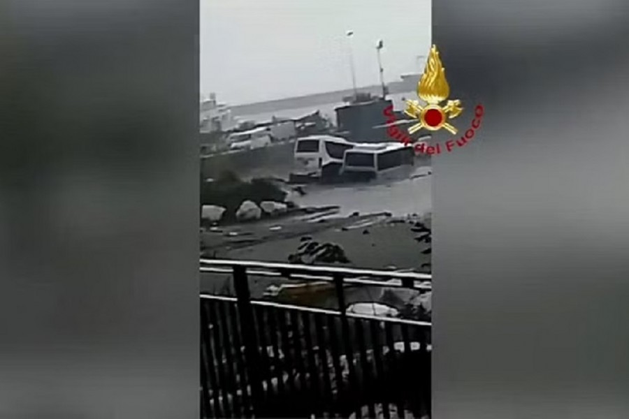 Damaged cars are seen in the sea, following a landslide on the Italian holiday island of Ischia, Italy November 26, 2022 in this still image taken from handout video.Vigili del Fuoco/Handout via REUTERS