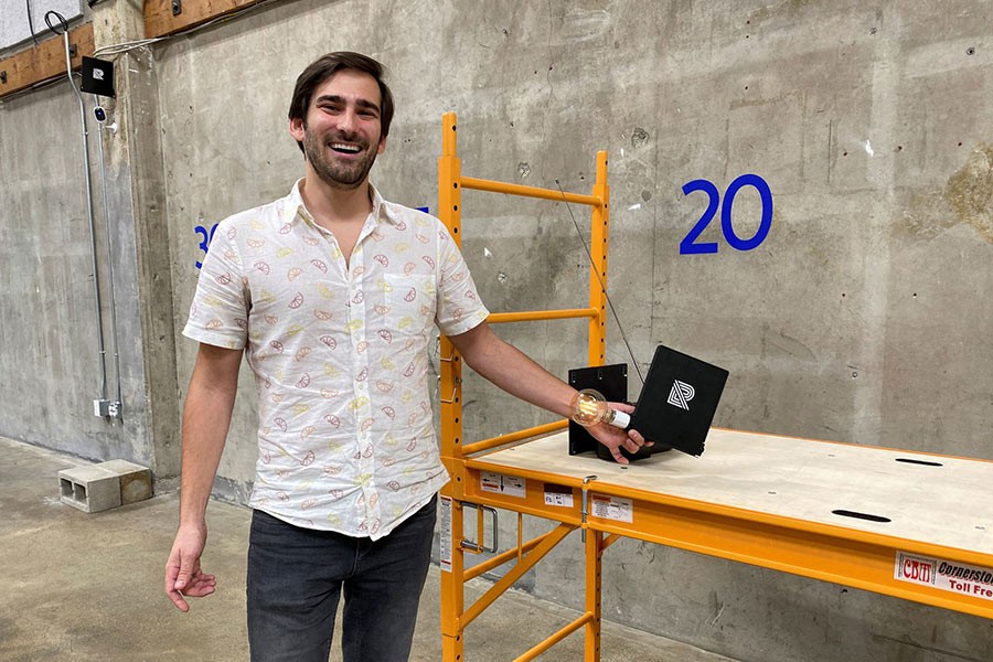 Chris Davlantes, CEO and founder of a Silicon Valley startup that beams electricity wirelessly, showing how the system works in Redwood City of California in US on November 29 this year –Reuters file photo