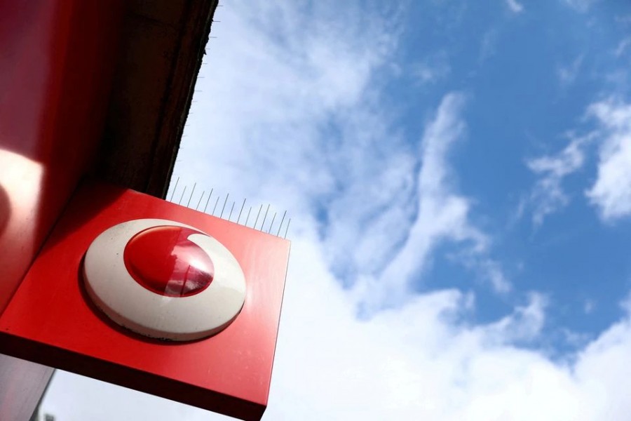 A branded sign is displayed on a Vodafone store in London, Britain on May 16, 2017 — Reuters/Files