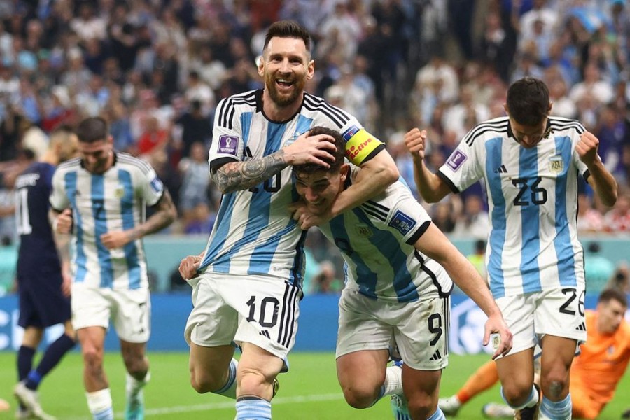 FIFA World Cup Qatar 2022 - Semi Final - Argentina v Croatia - Lusail Stadium, Lusail, Qatar - December 13, 2022 Argentina's Julian Alvarez celebrates scoring their second goal with Lionel Messi REUTERS/Carl Recine