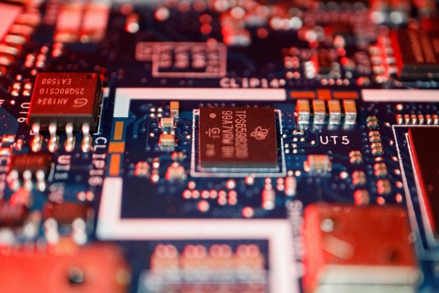 Semiconductor chips are seen on a circuit board of a computer in this illustration picture taken February 25, 2022. REUTERS/Florence Lo/Illustration/File Photo