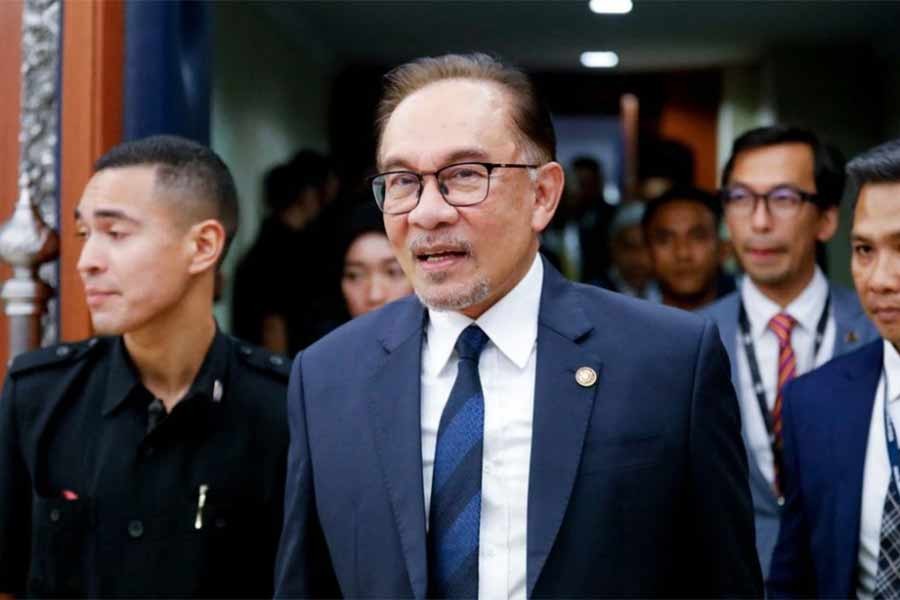 Malaysia's Prime Minister Anwar Ibrahim leaving the lower house of parliament in Kuala Lumpur on Monday after receiving a vote of confidence –Reuters photo