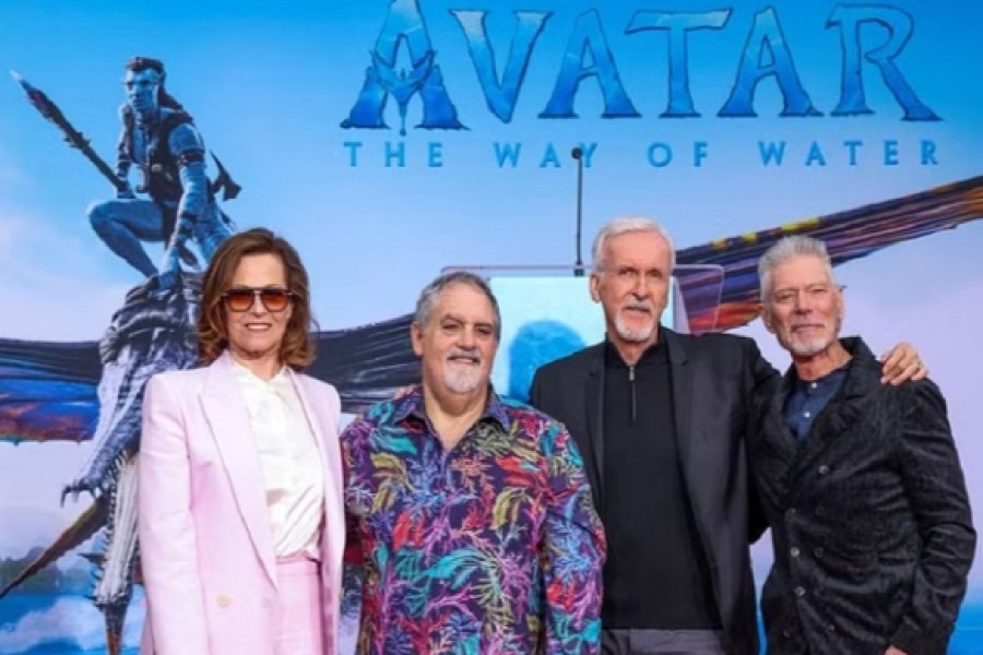 Director James Cameron and Producer Jon Landau pose along with Sigourney Weaver and Stephen Lang during an event where they placed their handprints and footprints in cement at the forecourt of the TCL Chinese Theatre in Los Angeles, California, US, Jan 12, 2023. REUTERS