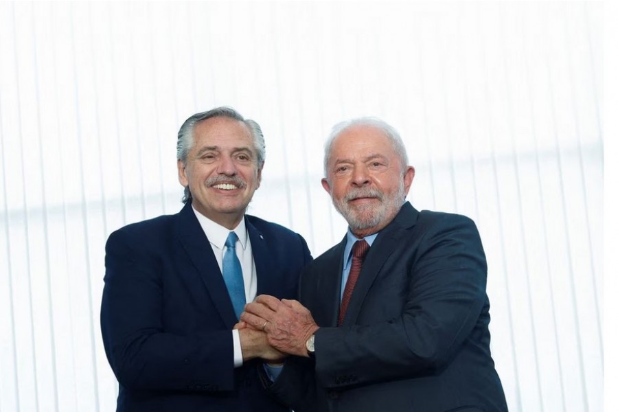 Argentina's President Alberto Fernandez greets Brazil's President Luiz Inacio Lula da Silva at the Itamaraty Palace in Brasilia, Brazil, January 2, 2023. REUTERS/Adriano Machado/File Photo