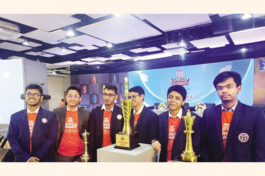 Champions of the Marks Active School Chess Championship from St Joseph Higher Secondary School, Dhaka pose with the trophy