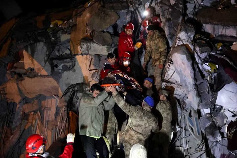 Cennet Sucu is rescued under the rubble of collapsed hospital in Iskenderun, Turkey February 6, 2023. REUTERS