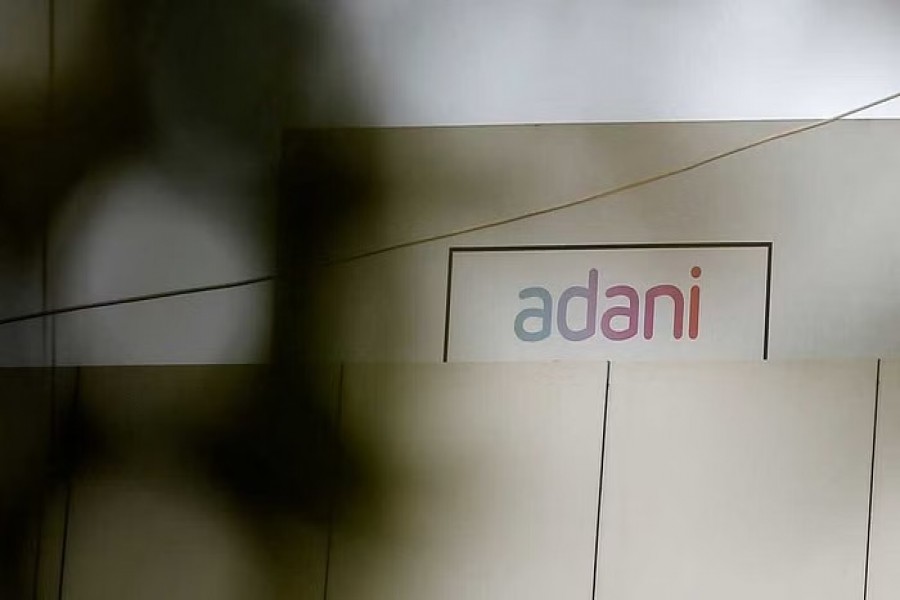 The logo of the Adani Group is seen on one of its buildings in Ahmedabad, India, Jan 27, 2023. REUTERS