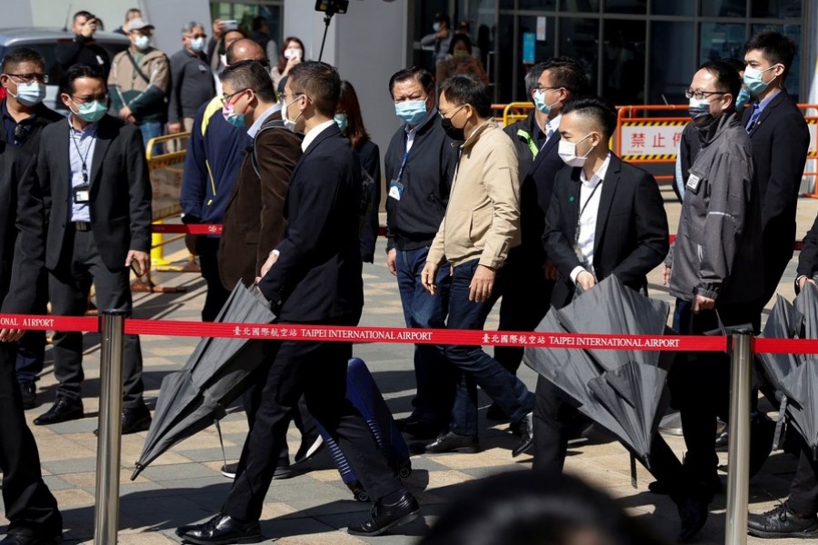 Liu Xiaodong, Deputy Head of the Shanghai office of China's Taiwan Affairs Office and head of the delegation of Chinese officials visiting Taiwan, walks out of the arrival hall at Taipei Songshan Airport in Taipei, Taiwan February 18, 2023. REUTERS/Carlos Garcia Rawlins