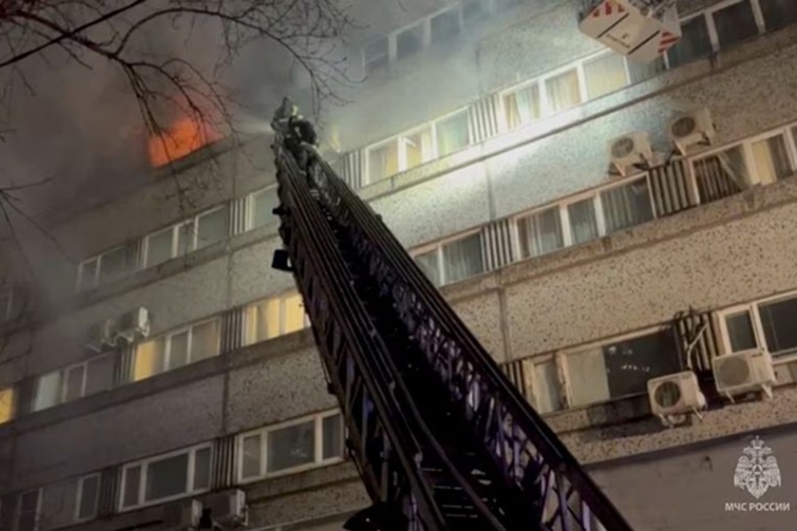 Firefighters put out a fire in the building which houses the MKM hotel in Moscow, Russia on February 21, 2023, in this still image taken from video — Russian Emergencies Ministry/Handout via REUTERS