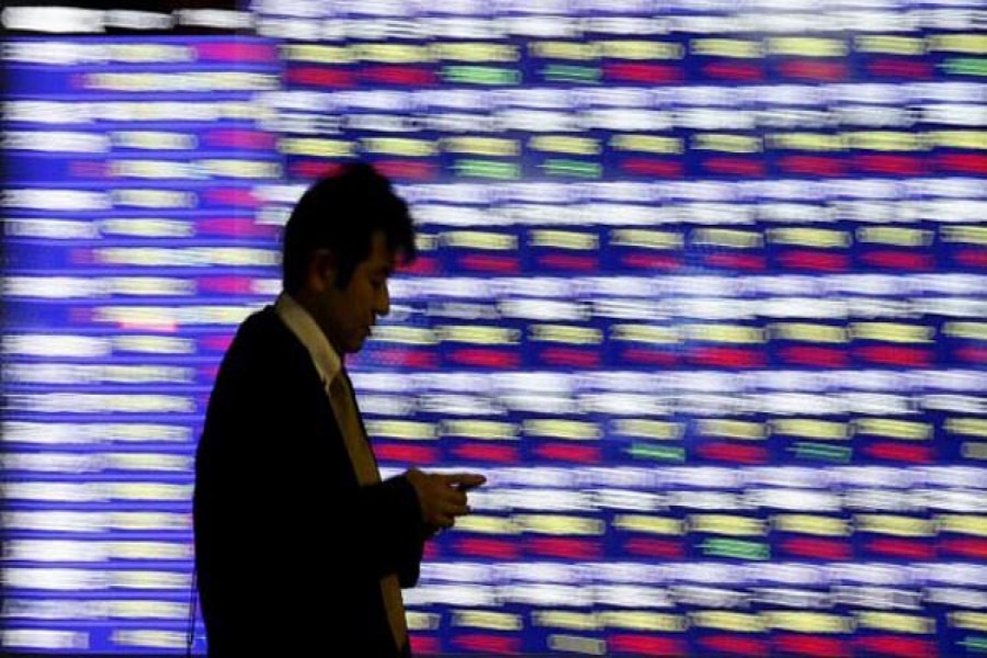 Asian shares mostly higher