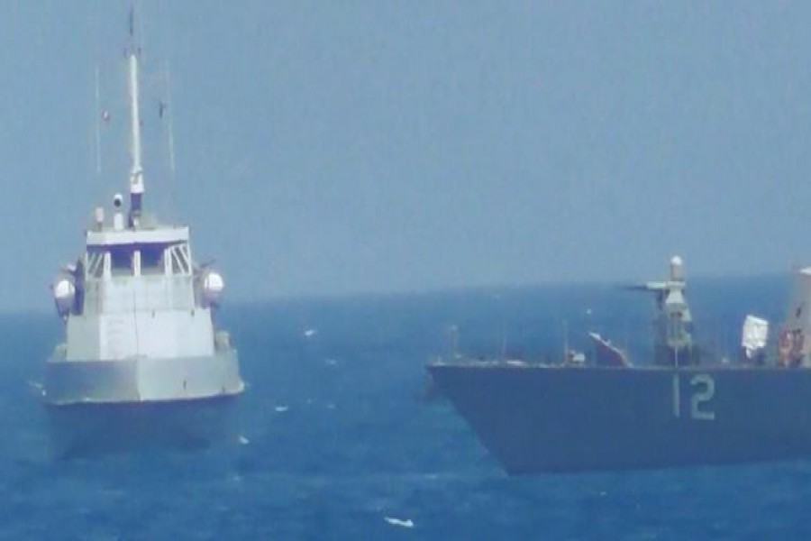 US Navy ship fires warning shots near Iranian vessel