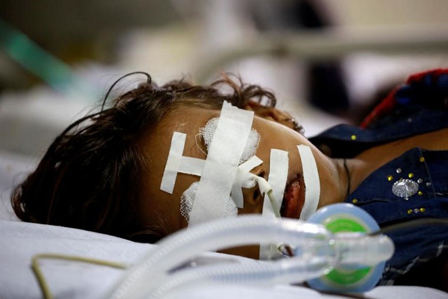 A child is seen in the intensive care unit in the Baba Raghav Das hospital in Gorakhpur district, India August 13, 2017. Reuters