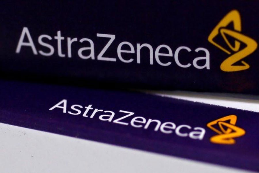 The logo of AstraZeneca is seen in the photo.