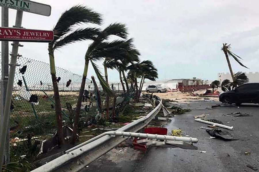 This Sept. 0 6, 2017 photo shows storm damage in the aftermath of Hurricane Irma, in St. Martin. Irma cut a path of devastation across the northern Caribbean, leaving thousands homeless after destroying buildings and uprooting trees. 	— AP photo