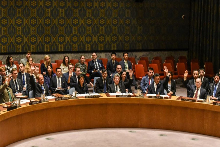 Ambassadors to the UN vote during a United Nations Security Council meeting on North Korea in New York City on Monday.