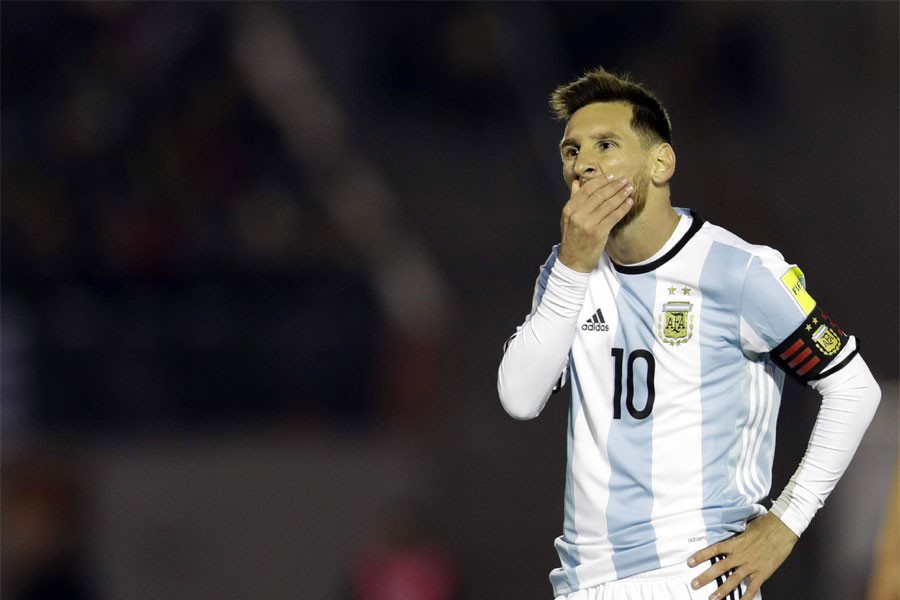 Argentina's Lionel Messi gestures during a 2018 World Cup qualifying soccer match against Uruguay in Montevideo. | AP