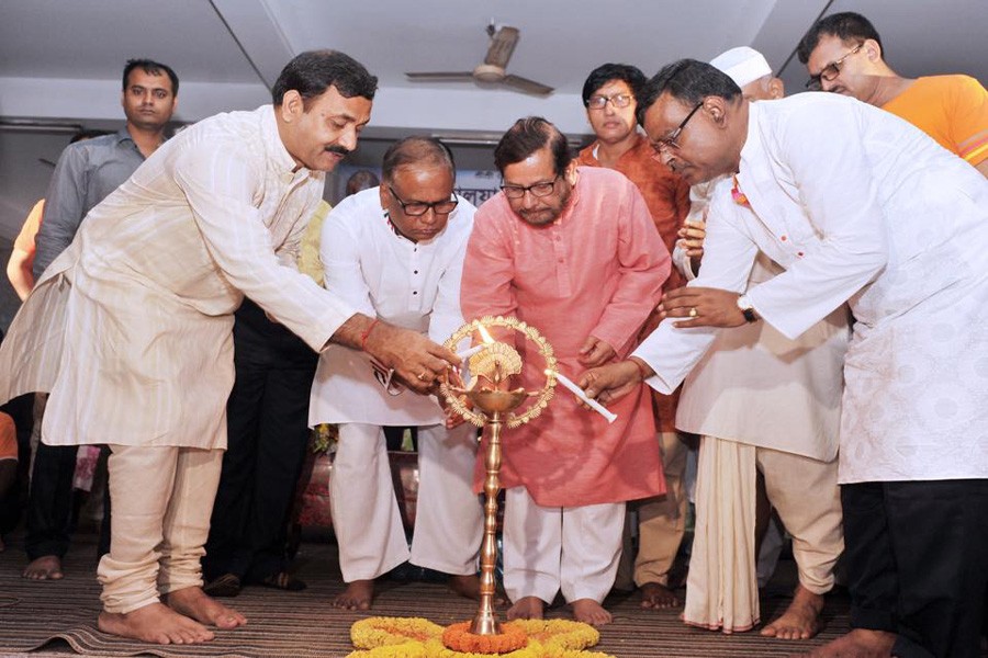 Cultural Minister Asaduzzaman Noor inaugurated the festival as chief guest by lighting the candle. - UNB