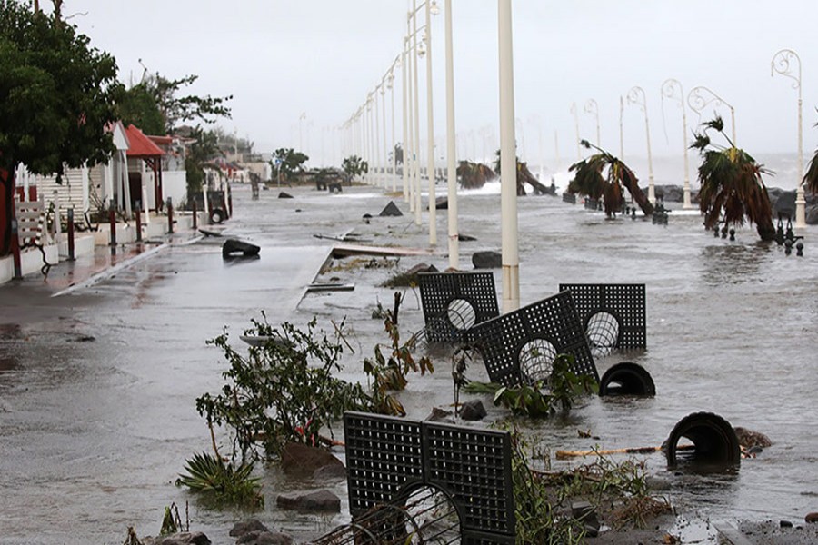 Debris lies on a flooded seafront after the passage of Hurricane Maria in Basse-Terre, Guadeloupe island, France on Tuesday. - Reuters photo
