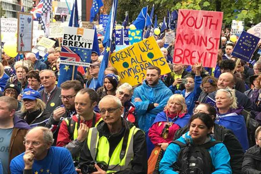 Ant-Brexit activists protest Tory austerity policies