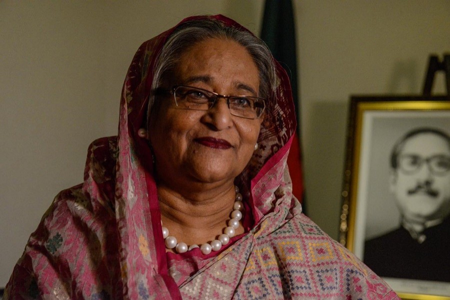 Prime Minister Sheikh Hasina speaks with a reporter during the United Nations General Assembly in New York City, US September 18, 2017. Reuters