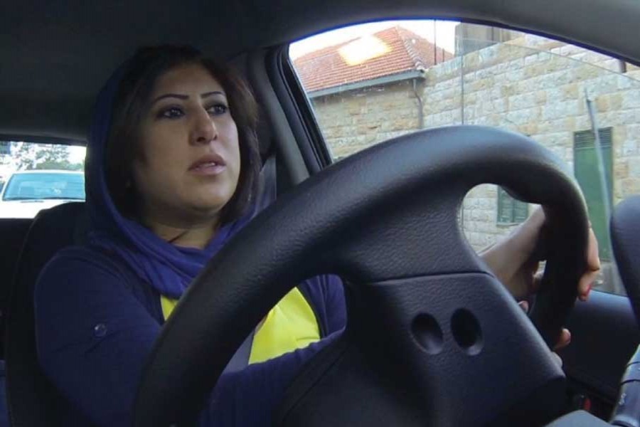Women in Saudi Arabia on October 26, 2013 defied their nation's de facto ban on women driving by getting behind the steering wheel.