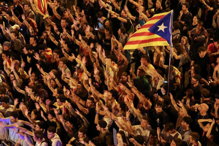 Catalonians raise arms and shout during a demonstration two days after the October 1 banned independence referendum. - Reuters photo