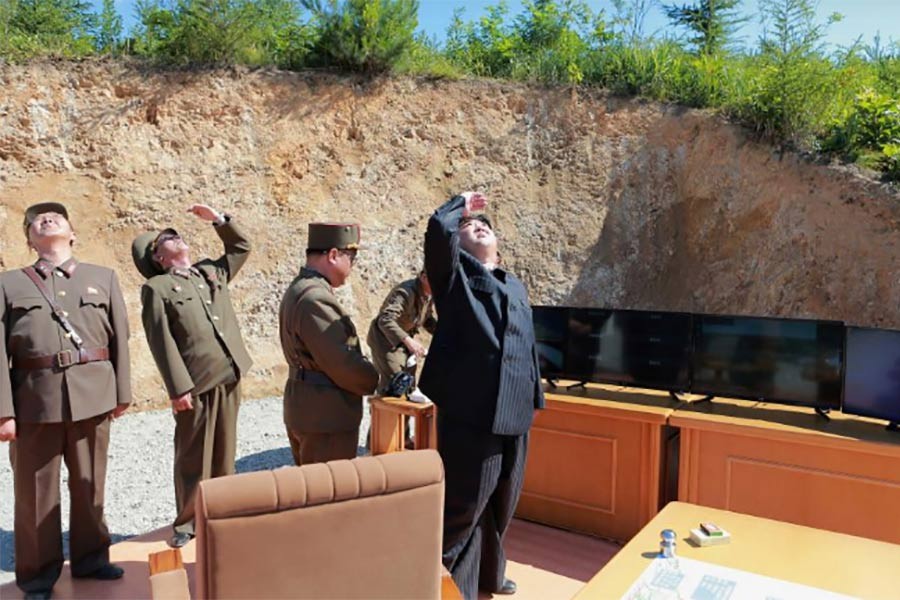 Kim Jong Un looks on during the test-launch of the intercontinental ballistic missile Hwasong-14, in this photo released July 5, 2017. Photo: KCNA via REUTERS