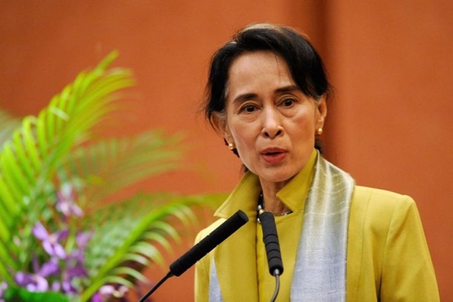 Suu Kyi urges unity, creates new aid committee