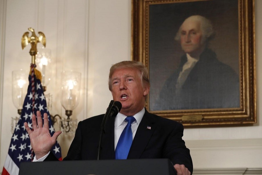 US President Donald Trump speaks about the Iran nuclear deal in the Diplomatic Room of the White House in Washington, US, Oct 13, 2017. Reuters