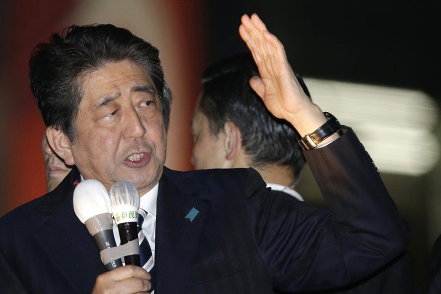 Japan’s Prime Minister Shinzo Abe delivers a speech in support for his party’s candidate during an campaign in Tokyo. -AP Photo