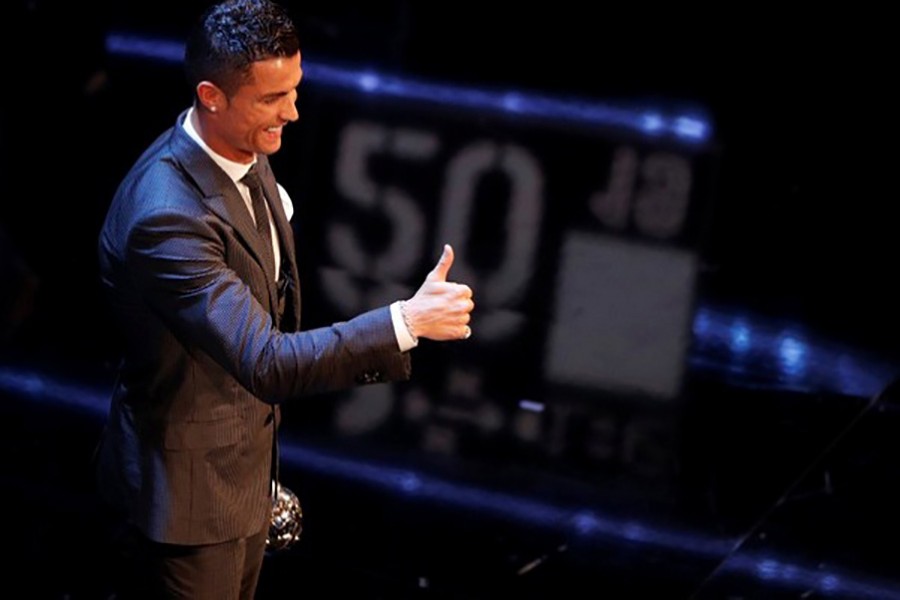 Real Madrid’s Cristiano Ronaldo celebrates after winning The Best FIFA Men’s Player Award. - Reuters photo