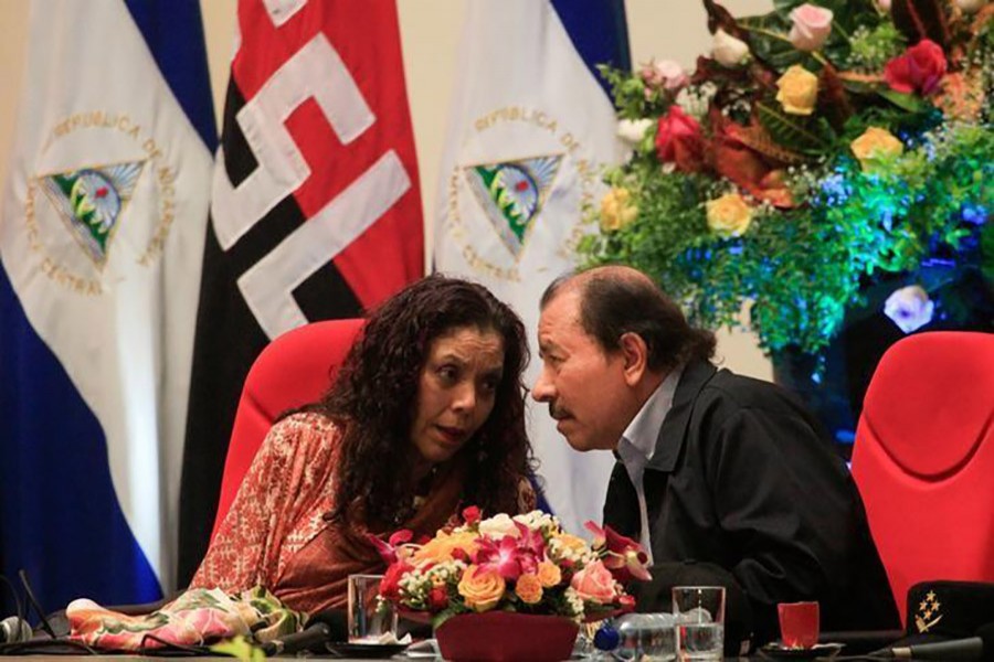 Nicaragua's president Daniel Ortega speaks with his wife and vice-president Rosario Murillo during an event on September 1 last. - Reuters file photo