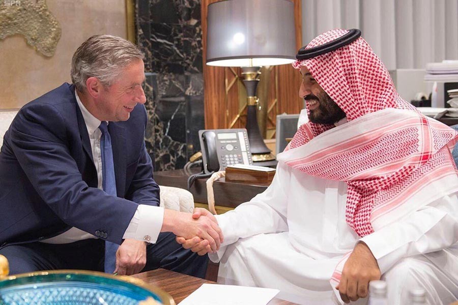 Saudi Crown Prince Mohammed bin Salman shakes hands with NEOM's Chief Executive Officer Klaus Kleinfeld on Tuesday. -Reuters Photo