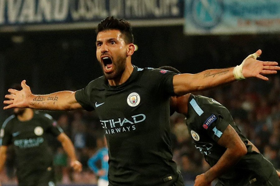 Manchester City's Sergio Aguero celebrates scoring their third goal against Napoli at Stadio San Paolo, Italy. - Reuters photo