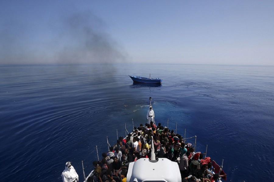 Representational image: Italian police carry migrants to safety, leaving their leaky boat to drift. Reuters