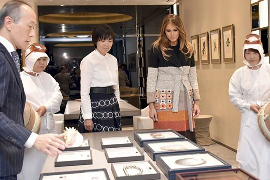 Abe’s wife, Akie, greeted the first lady as she arrived at the Mikimoto Pearl flagship store in Tokyo’s glitzy Ginza shopping district. - AP photo