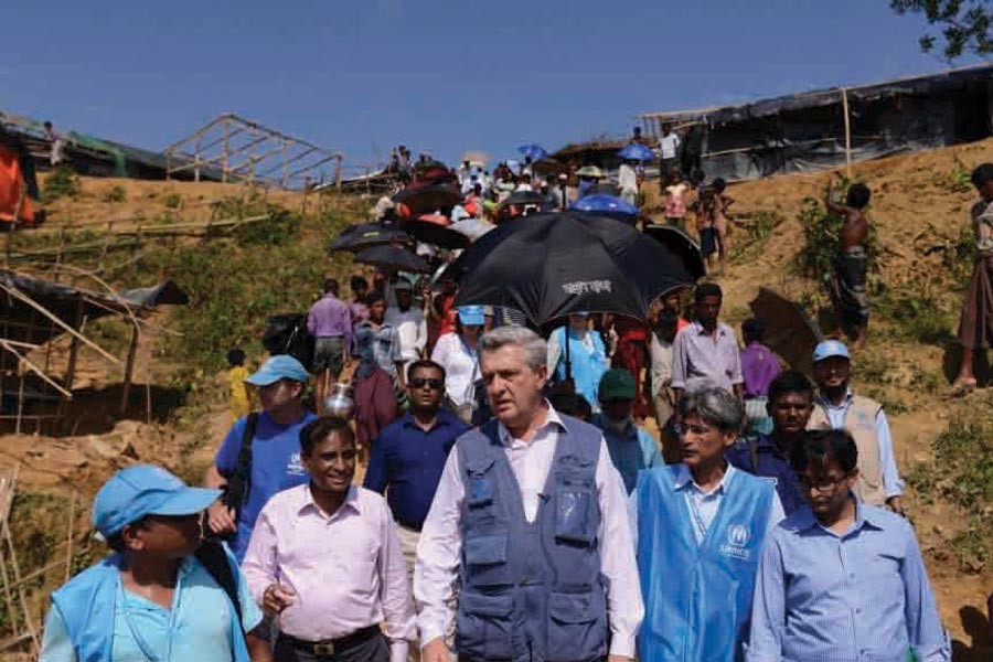 United Nations High Commissioner for Refugees Filippo Grandi, centre, visits newly arrived Rohingya Muslims at Kutupalong refugee camp on September 23, 2017.  —Photo: AP