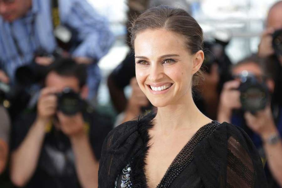 Director and actress Natalie Portman poses for photographers at the photo call for the film 'A Tale of Love and Darkness,' at the 68th international film festival, Cannes, France. (AP Photo)