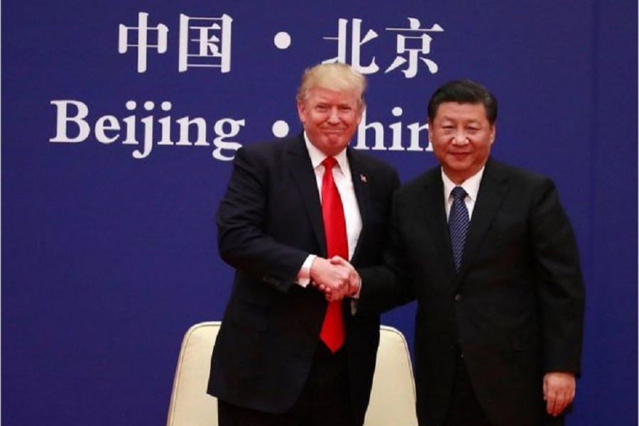 Mr Trump was effusive in his praise and thanks to Mr Xi. Photo: EPA/BBC